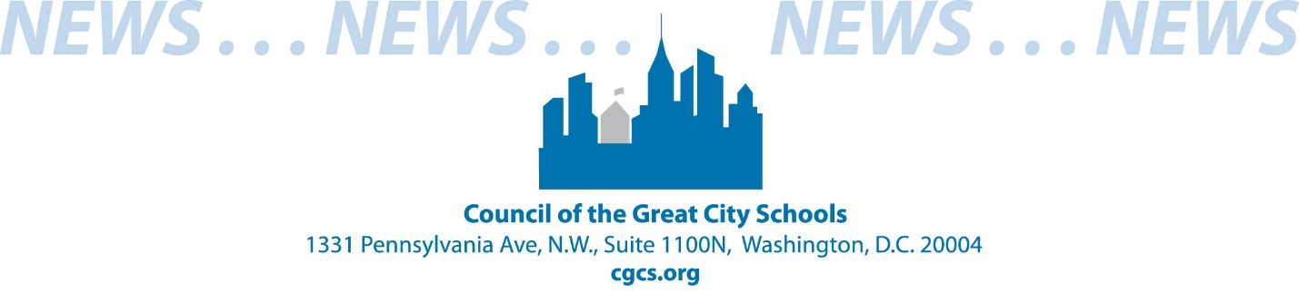 A blue and white logo with buildings and textDescription automatically generated